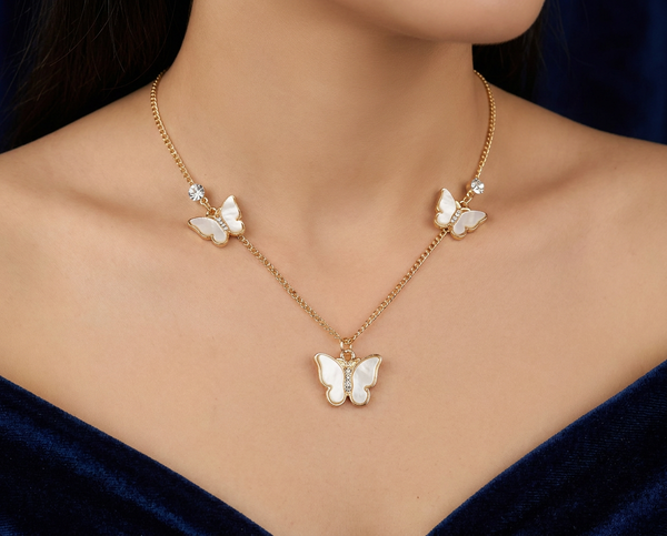 White butterfly charm necklace from Desire Jewellery